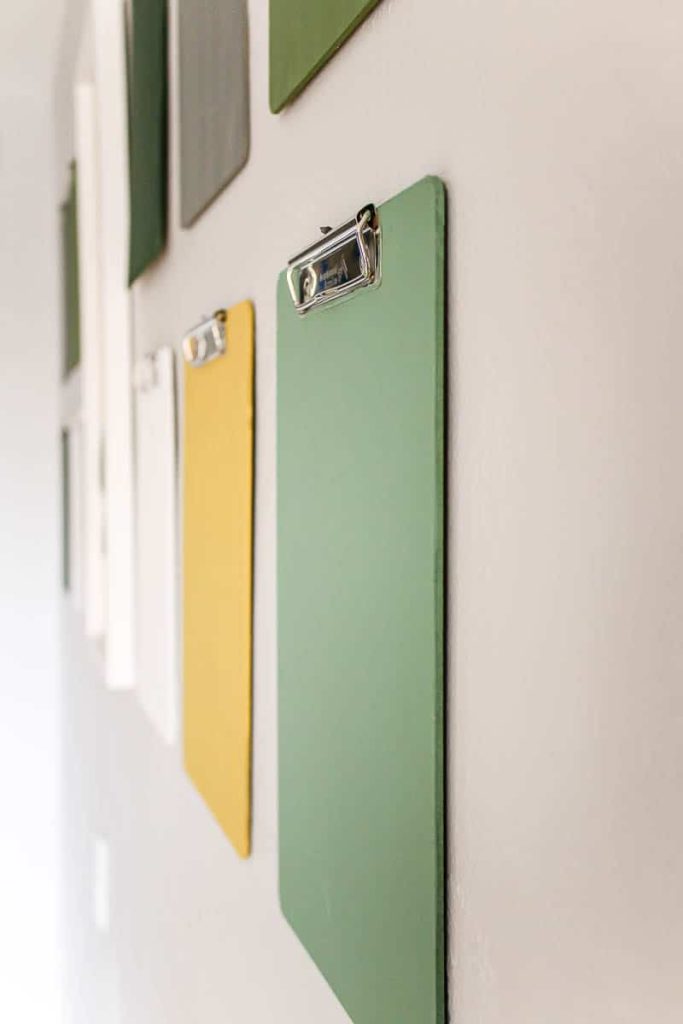 Creating a clipboard gallery wall that's perfect for hanging kid's artwork