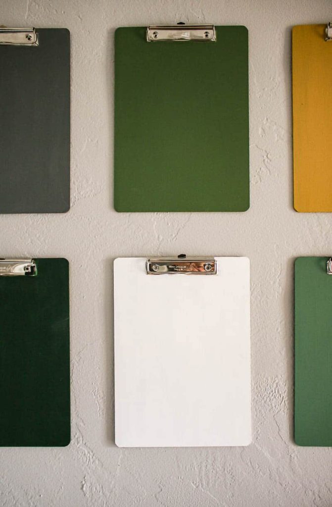 Colorful painted clipboards make an easy and fun gallery wall