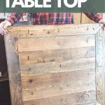 shows a person holding up the top wood part of the table showing pocket hole joinery with overlay texts that says easy to build table top, get the free plans