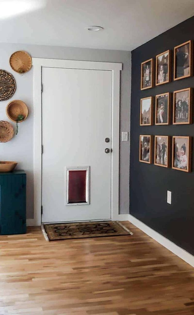 Our modern boho style entry way, complete with a grid gallery wall and wicker basket wall