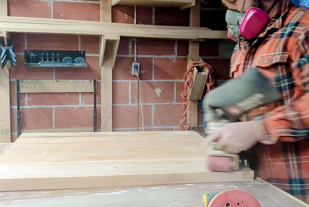 The interior slats are being assembled to complete the structure.