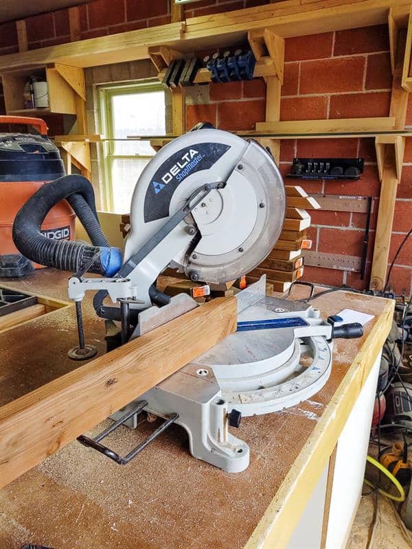 Using miter saw to cut pressure treated wood at an angle