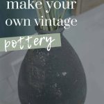 shows a black texture vase on a bathroom sink with greenery sticking out of it with a real wall background with overlay text that says how to make your own vintage pottery