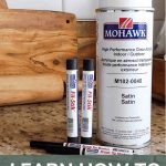 shows Mohawk products such as Fil-Stik, brush tip markers, and spray can of acrylic sealer on a granite counter with text at bottom that says learn how to fill holes in wood