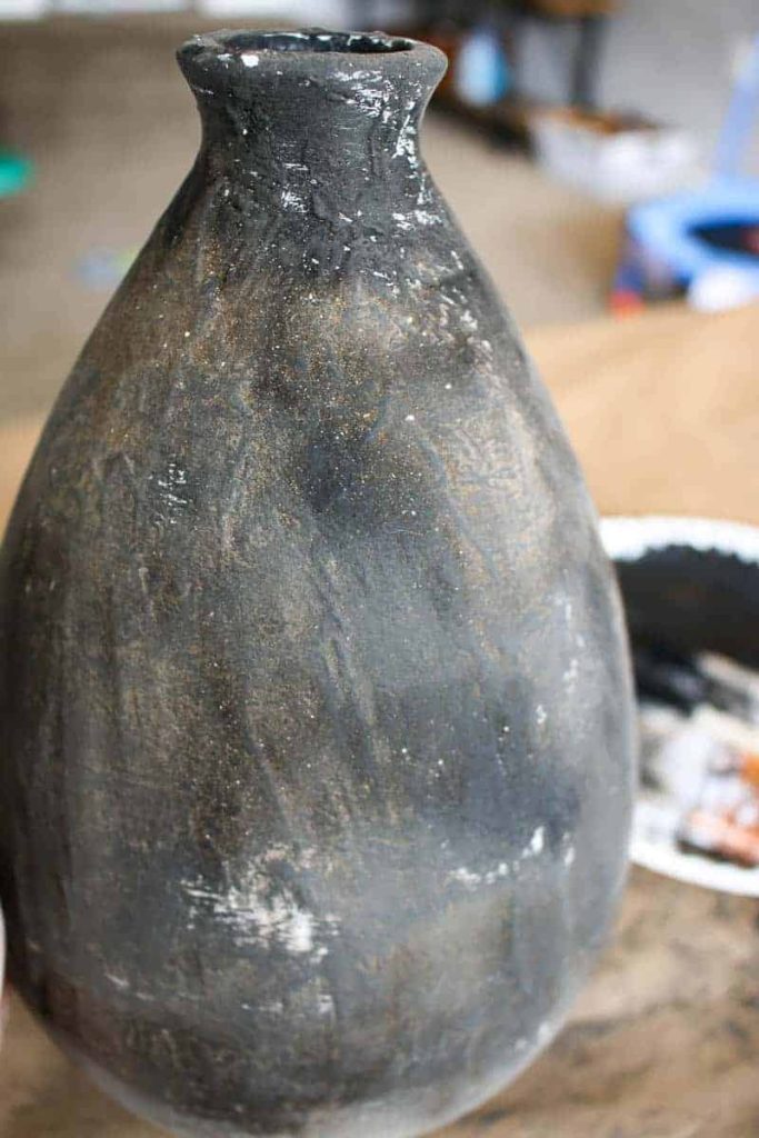 Dirt + joint compound + paint makes this vase look like aged stoneware sold at Pottery Barn!