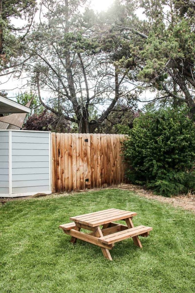 This toddler sized picnic table is perfect for kids to play around in the backyard