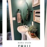 shows a view from the shows of the toilet and sink with a dark teal wall and gray tile floors with white stripes and boho home decor with overlay text that says boho small bathroom