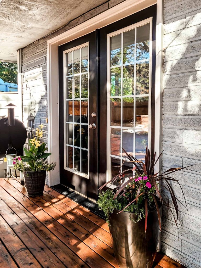 Not sure what black paint color to use on your front door? Keep it simple with Behr Black, a true black with no other undertones.