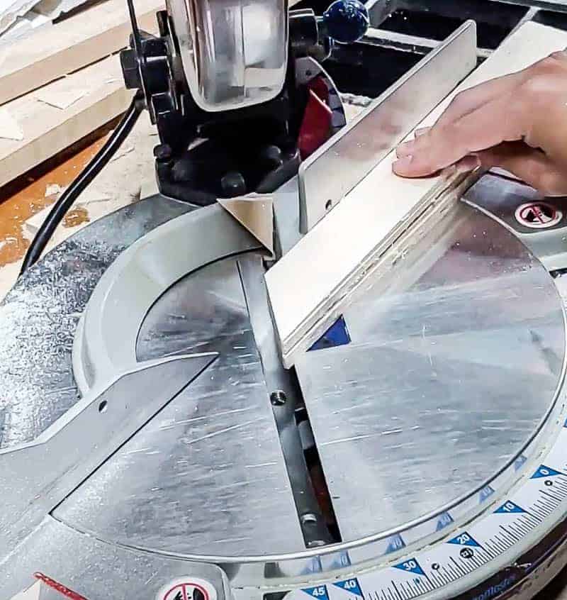 shows a table saw cutting wood shims at a diagonal