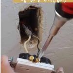 shows hands screwing in a new outlet into the wall with overlay text that says how to install a new outlet