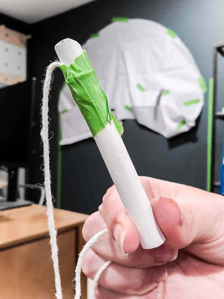 chalk is tied to a string