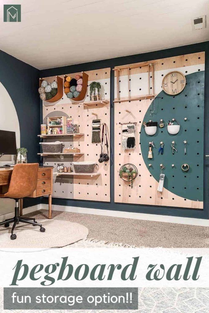 Painted pegboard wall with items stored and hanging with overlay text that says pegboard wall: Fun storage option