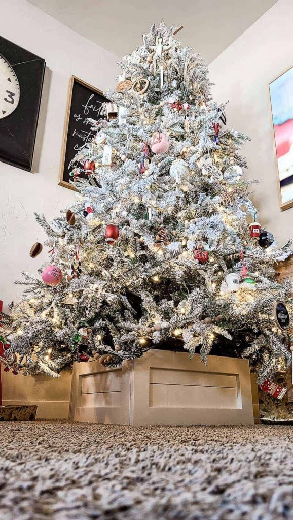 shows an upward angled photo of the Christmas tree and the shiplap tree stand box