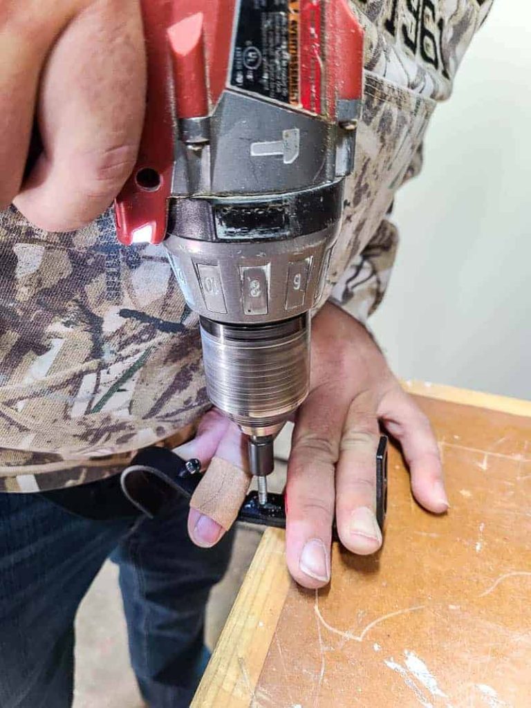 Drilling screw into curtain rod bracket
