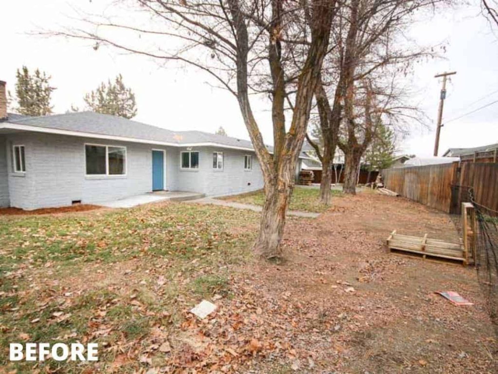shows a before picture of the backyard with overlay text that says before
