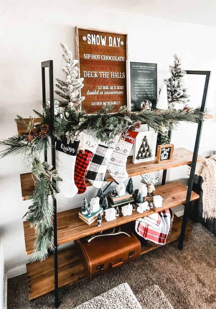 Bookshelf with Christmas decorations in living room