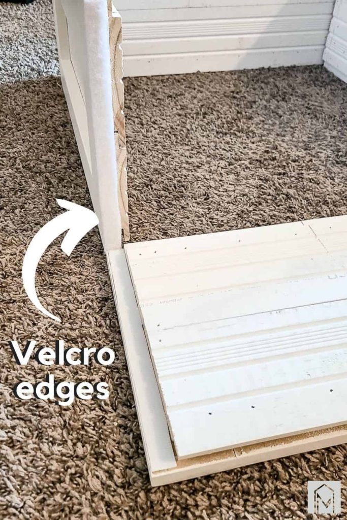 shows the velcro edges on the ends of the christmas tree collar with an arrow pointing and text overlay that says velcro edges