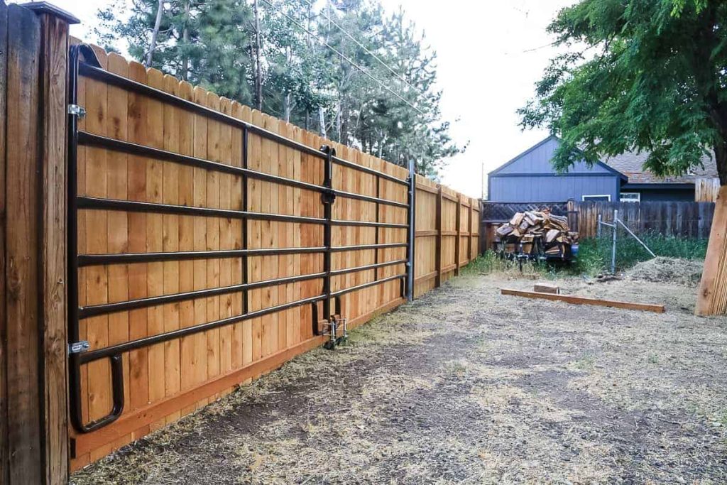 shows a new fence in the backyard