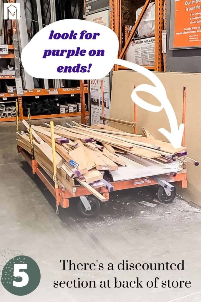 Stack of lumber pieces with purple paint on ends and text overlay saying 