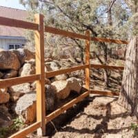 shows another angle of the framework for a fence