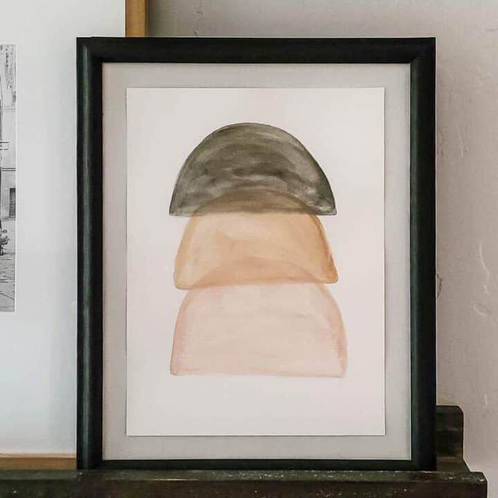 neutral boho wall art on shelves