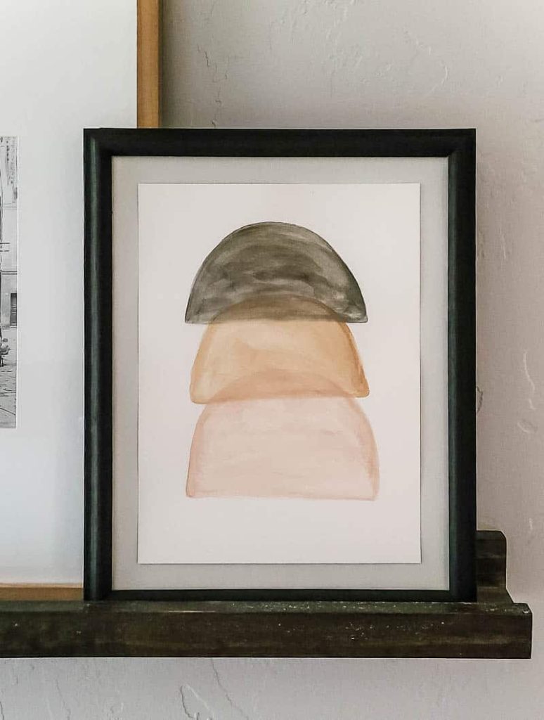 neutral boho wall art on shelves made with watercolors