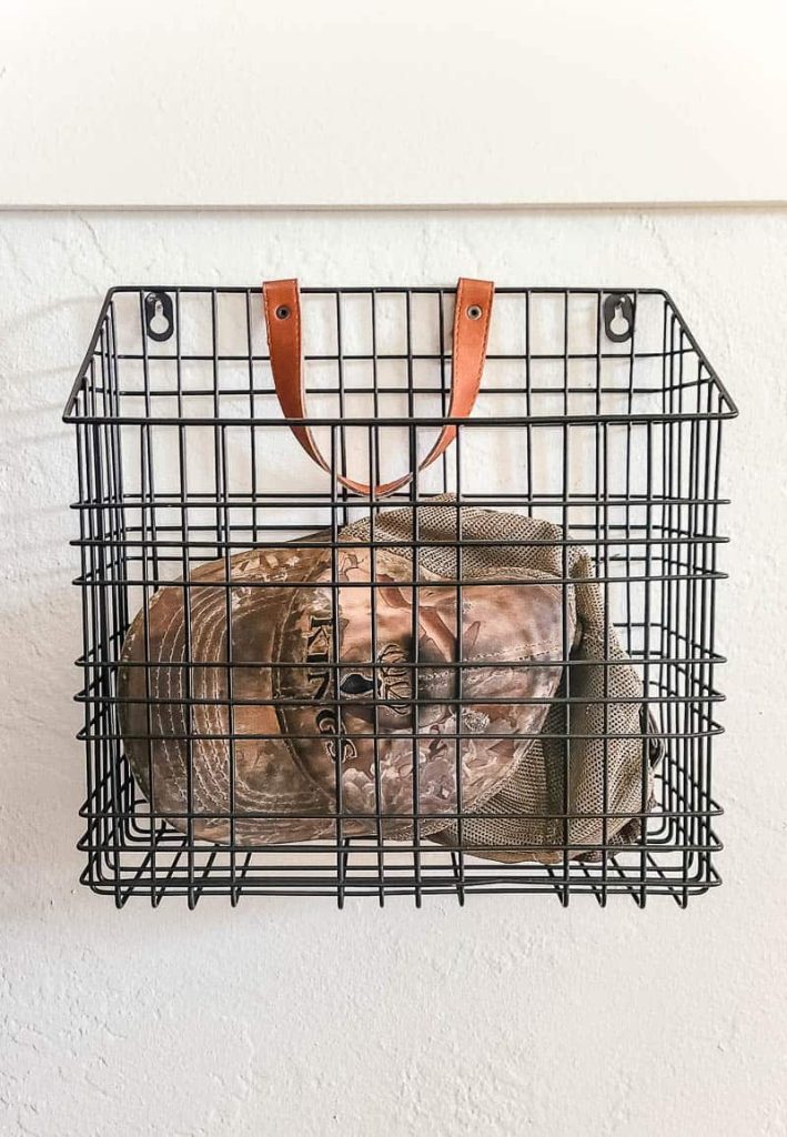 wire wall basket for baseball hat storage in walk in closet