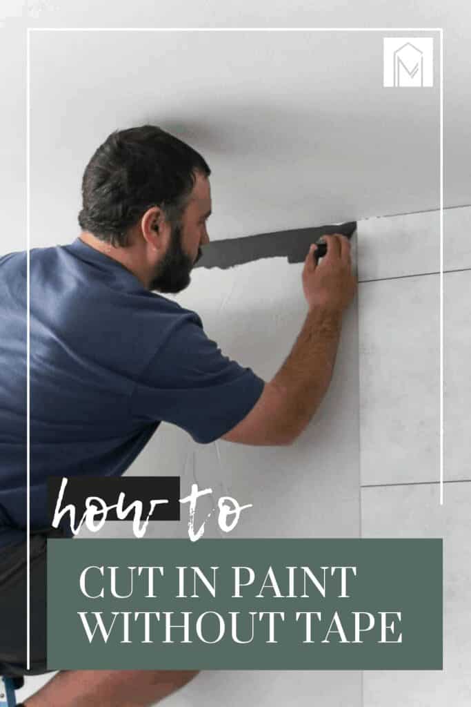 Man on top of a ladder holding a brush painting the edges of the ceiling with gray paint with text overlay that says how to cut in paint without tape