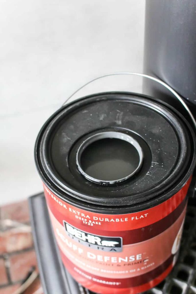 Graphic Charcoal color Gray paint in the Behr Paint Ultra scuff defense can 