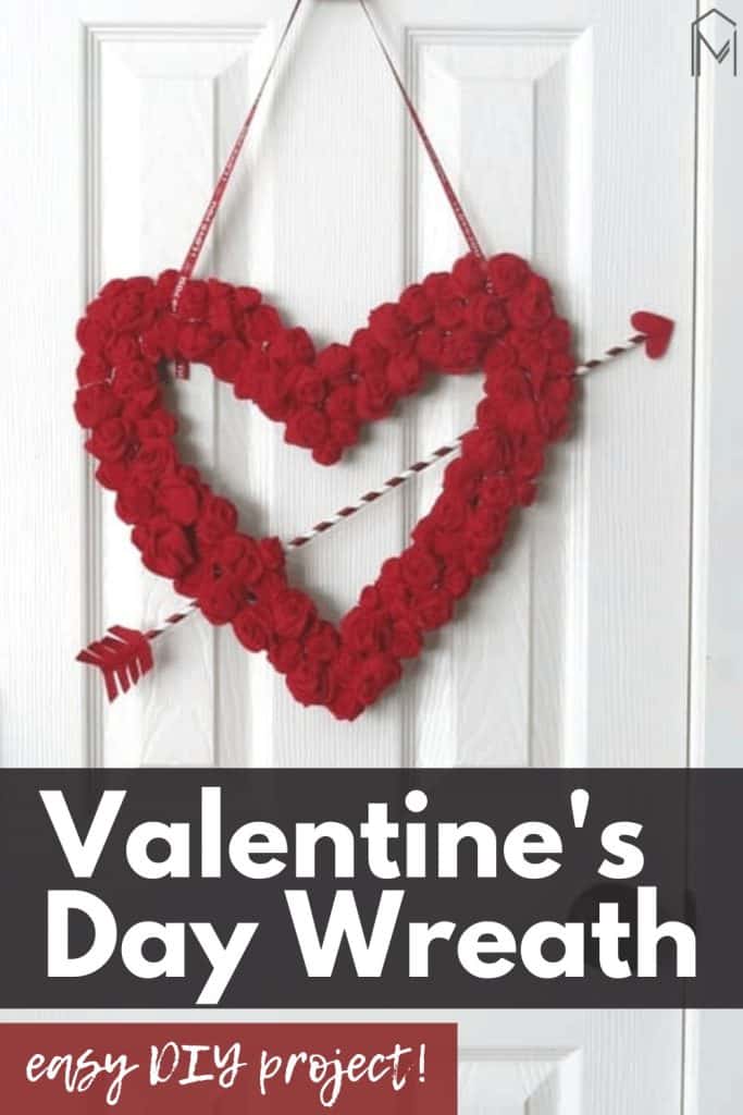 Valentine's Day wreath hanging on the door with text overlay that says Valentine's Day Wreath & Easy DIY wreath