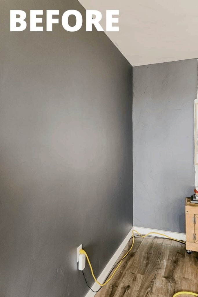 Gray wall before the wood slat accent wall makeover