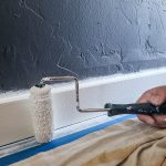 Although time-consuming, refreshing baseboards and trim will make a room shine and is well worth the effort. The crisp, clean look instantly squares up the space and makes everything feel new again.