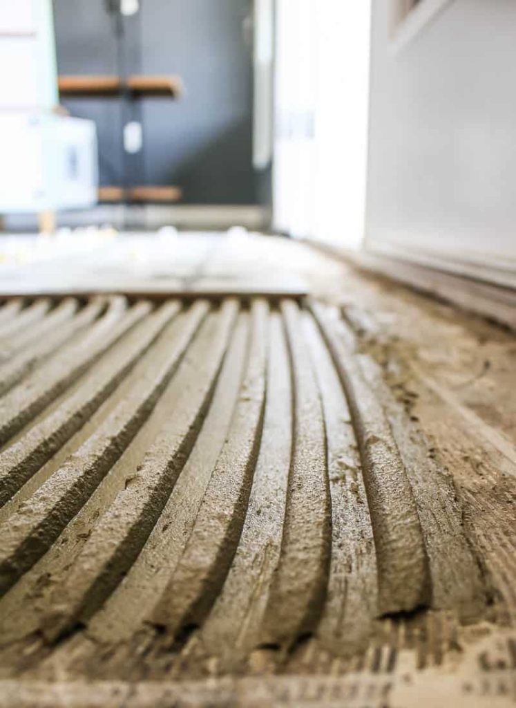 Thinset with notched ridges on the surface during tile install