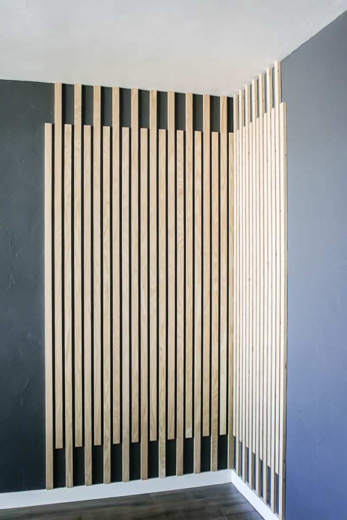Modern Wood Accent Wall in corner of room with dark gray walls painted with graphic charcoal paint by Behr