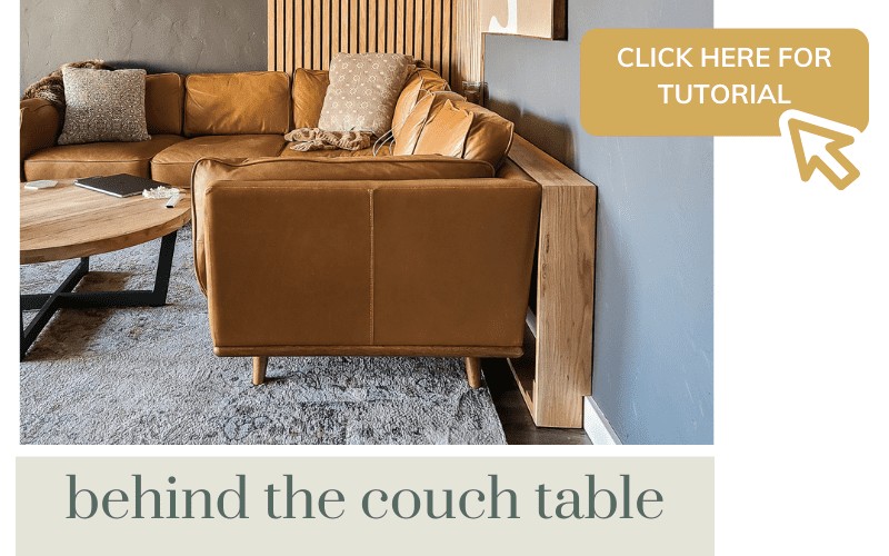 A modern living room behind the couch table.