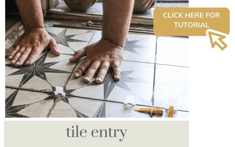 Man's hands pressing down on floor tile in entry of modern boho living room with text overlay "Click here for tutorial"