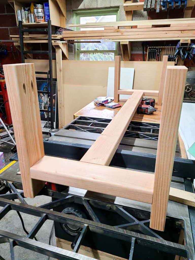 Image of frame for DIY bench sitting on work bench.