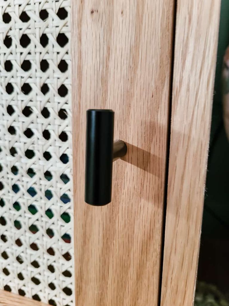 Install hardware for the nightstand door to complete its assembly.