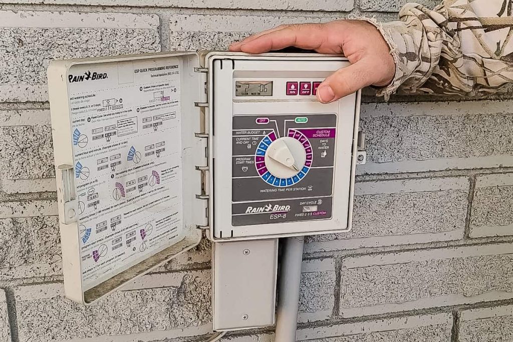 Adjust the time on your sprinkler control box on the side of the house to blow out each sprinkler zone individually