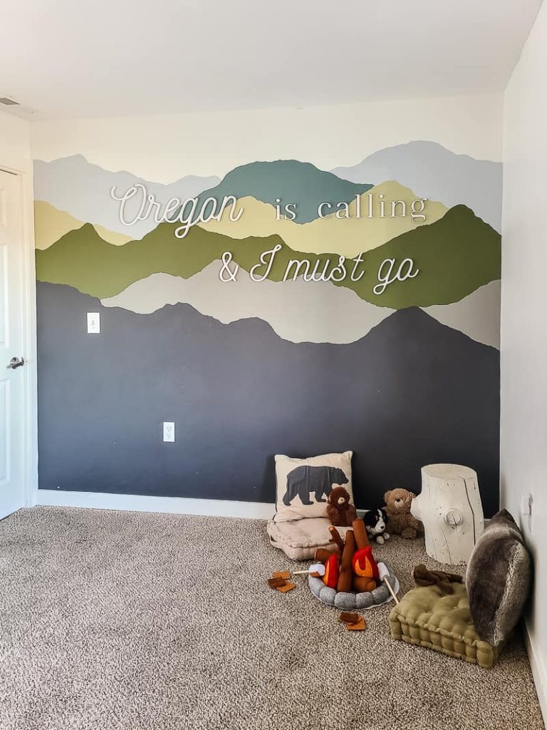 We added some floor pillows and stuffed animals to the corner with the felt play campfire for a fun little vignette. What a fun idea for camping themed bedrooms or playrooms ! 