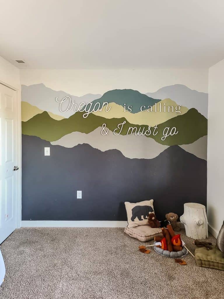 This quote wall with Oregon is calling & I must go is perfect for this Pacific Northwest camping themed vacation rental kid's bedroom in Oregon. 
