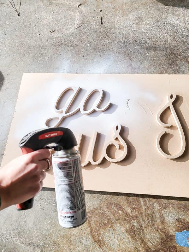 spray painting wooden letter cutouts