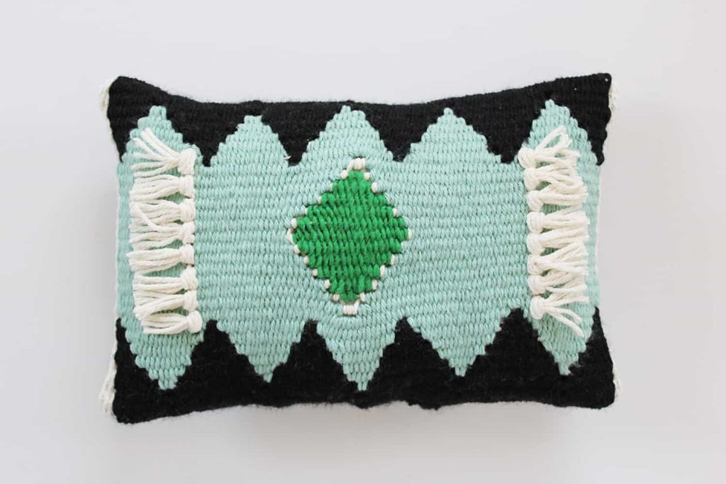 woven pillow cover in black, mint and green