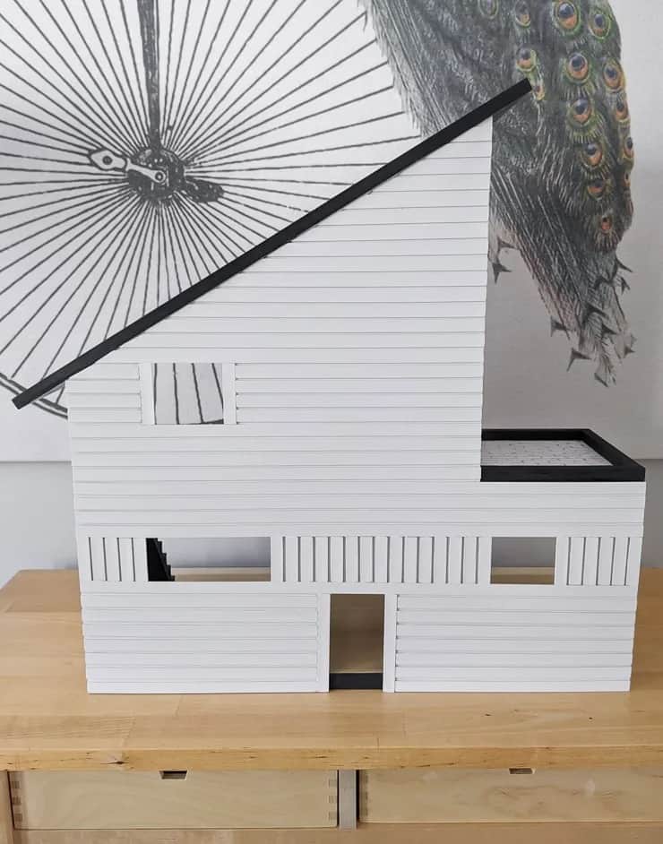 dollhouse with DIY siding