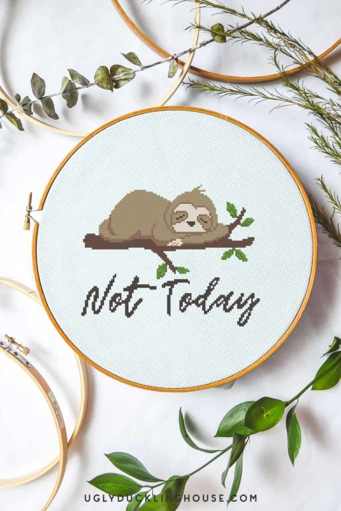 Sloth cross stitched with the saying "not today"