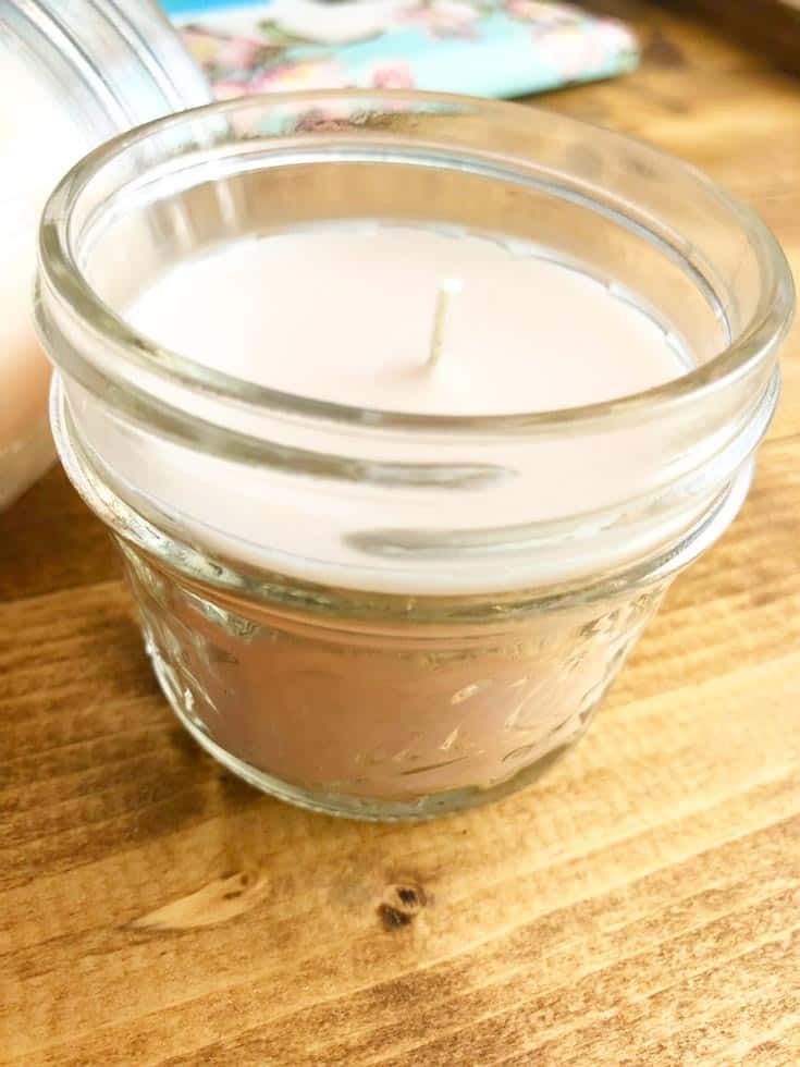 closeup view of candle in a jar