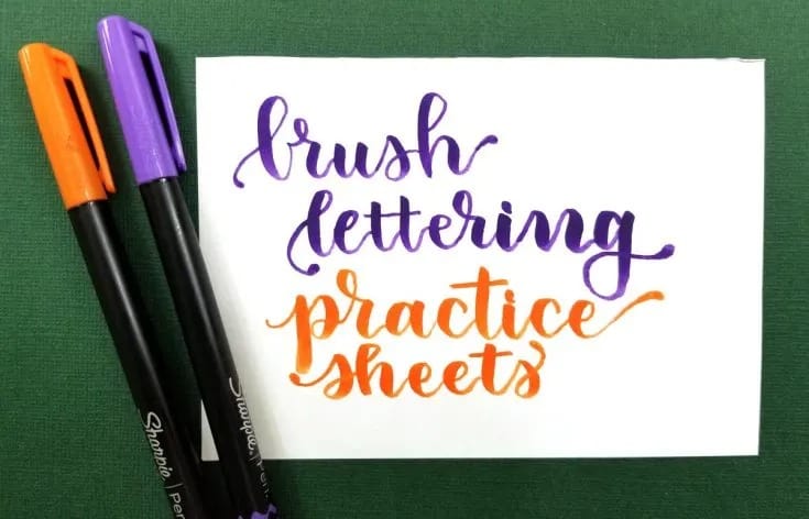 Brush lettering practice sheets, brush lettered on paper