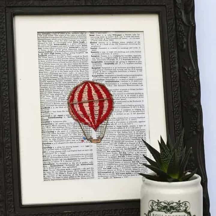 Hot air balloon embroidered on book page
