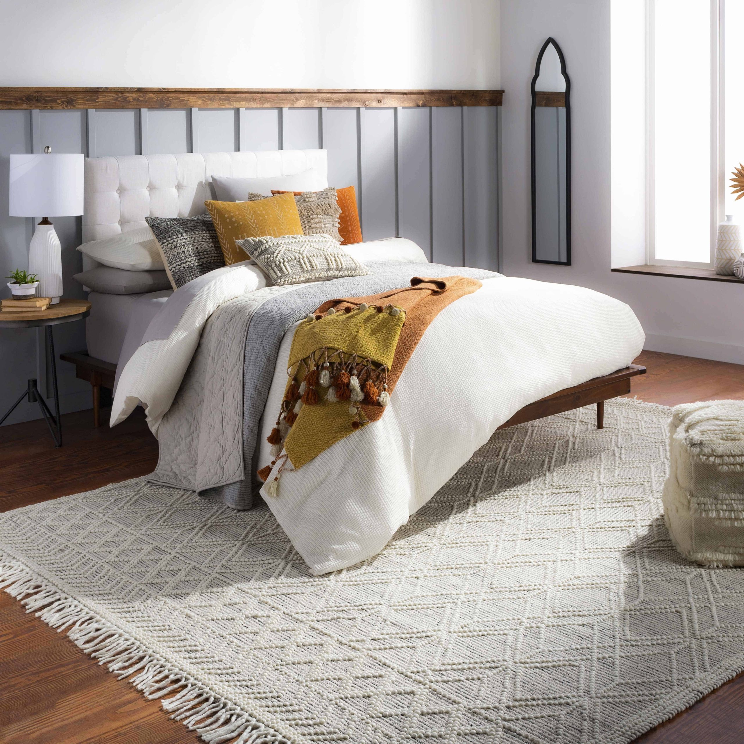 To add more character to your modern boho bedroom decor, get creative with the patterns! You can incorporate patterns into your bedroom with the bedding, throw pillows, curtains, blankets, or area rugs. 