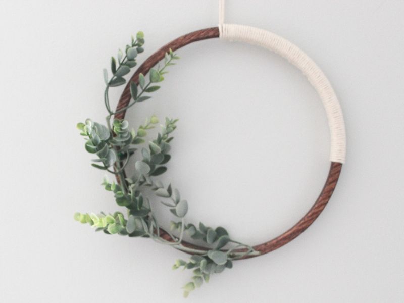 wreath made on wooden hoop with macrame string and eucalyptus